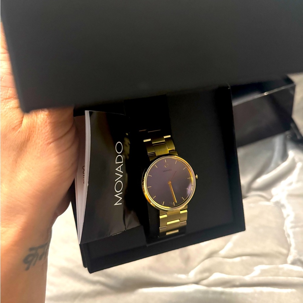 Brand New Movado Bold all gold watch unisex 
With box and paperwork